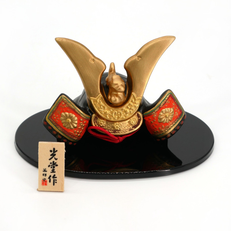 Japanese ornament black gold and orange kabuto helmet in ceramic and fabrics, SHUSSEKABUTO KINRYU, 7.5 cm