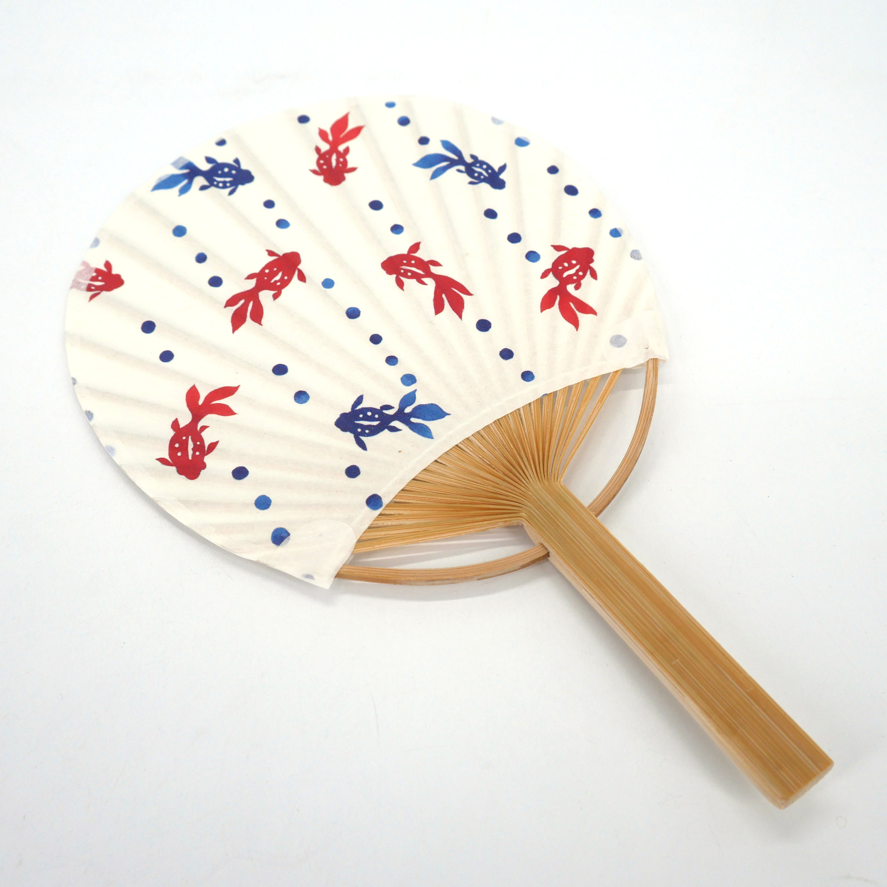 https://nipponboutique.fr/37112/small-japanese-non-folding-uchiwa-fan-in-paper-and-bamboo-with-red-and-blue-fish-pattern-sakana-aka-aoi-175x115-cm.jpg