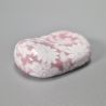 repose baguettes japonais fleur rose sur fond blanc