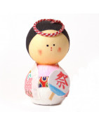 Japanische Okiagari-Koboshi-Puppen: Symbole für Ausdauer und Glück