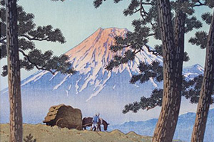Une estampe japonaise qui montre le mont Fuji en arrière-plan et un fermier et son âne tirant une charrette au premier plan